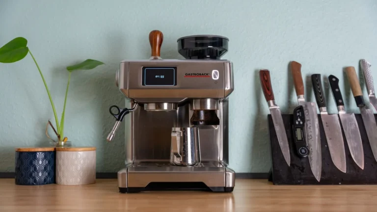 Home espresso machine with a built-in grinder on a kitchen counter