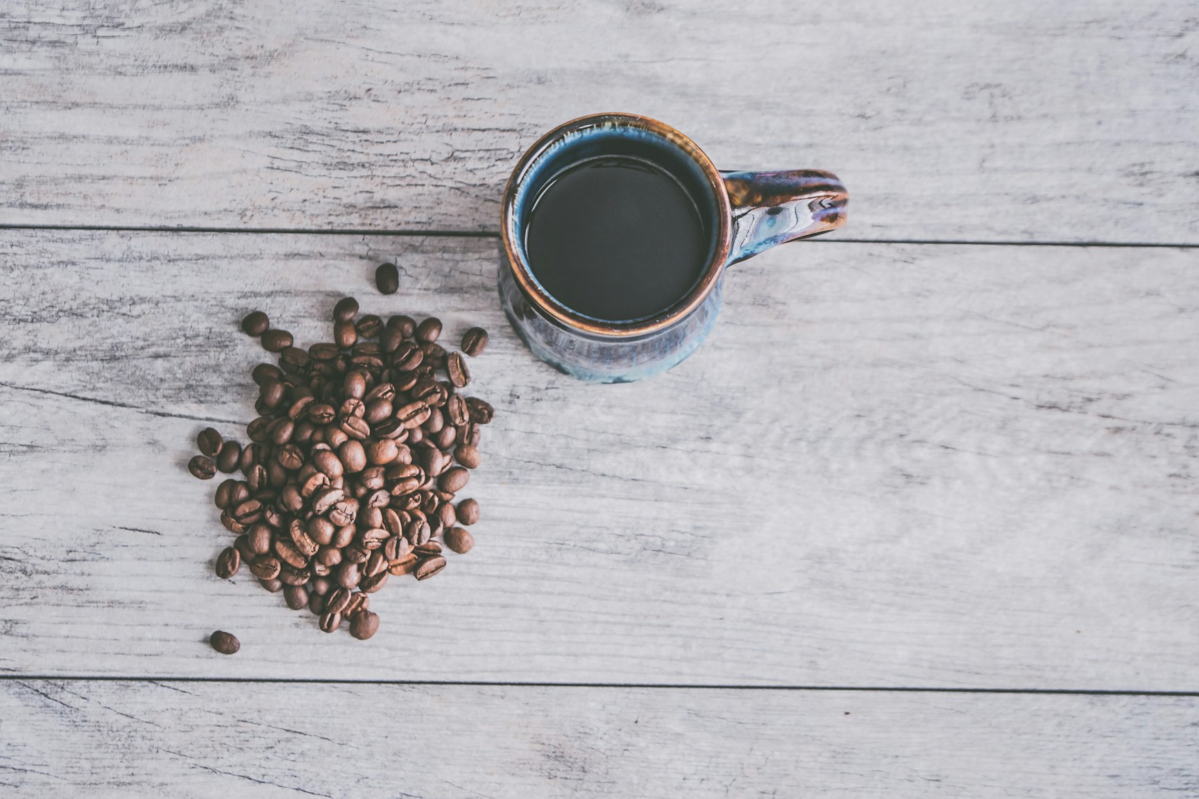 Coffee beans and grinder